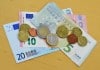 Some Euro Bank Notes and Coins - The Irish Place