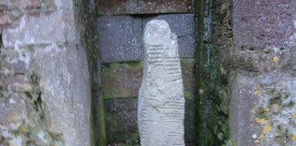 One of the Ogham Stones in St. Declan's Cathedral, Ardmore - The Irish Place