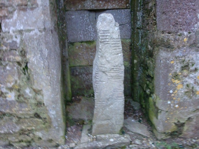 One of the Ogham Stones in Ardmore One of the Ogham Stones in St. Declan's Cathedral, Ardmore - The Irish Place