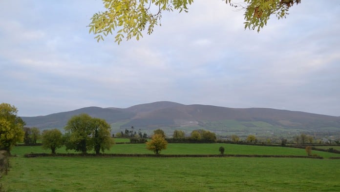 Sweeping view of the Anner Valley with the famous Slievenamon Mountain in the background - The Irish Place