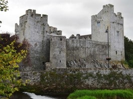 A view of the magnificent Cahir Castle from the banks of the River Suir - The Irish Place