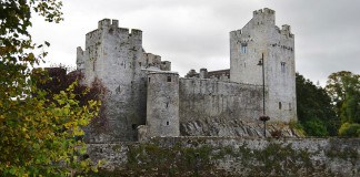 A view of the magnificent Cahir Castle from the banks of the River Suir - The Irish Place