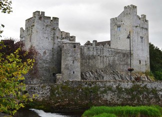 A view of the magnificent Cahir Castle from the banks of the River Suir - The Irish Place