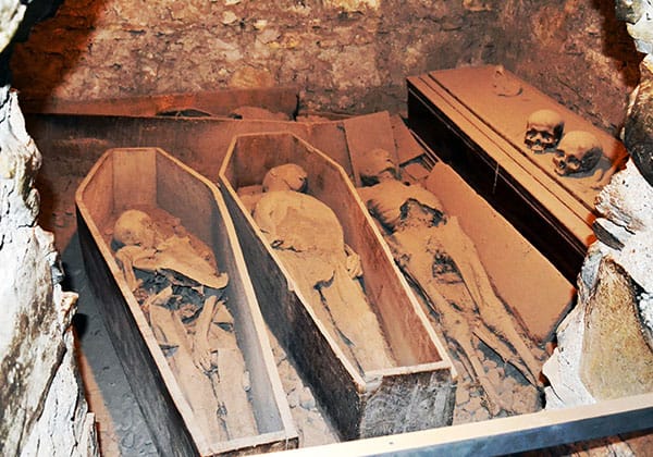 The famous four mummies of St. Michan's Church, from left to right, "The Nun", "The Thief", "The Unknown" and at the back "The Crusader" - The Irish Place