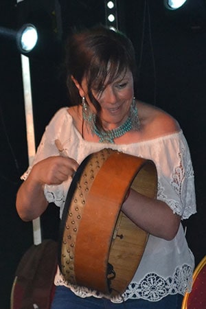 Cathy Jordan of Dervish in action on Bodhrán. - The Irish Place