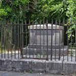 Anti-bodysnatching grille protecting a grave in Corofin