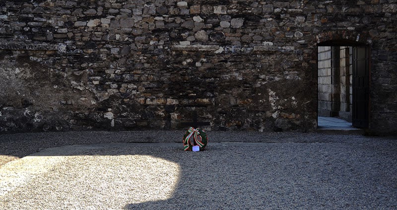 The Cross in the Stonebreakers Yard marking the spot where the leaders of the 1916 rising were executed. - The Irish Place