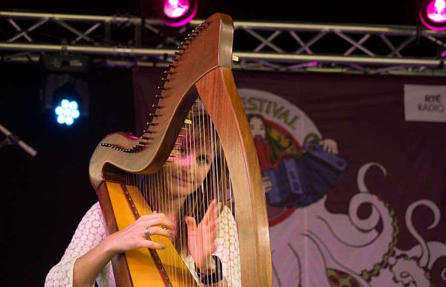 Elaine Hogan playing the Celtic Harp on stage at the 2017 Doolin Folk Festival