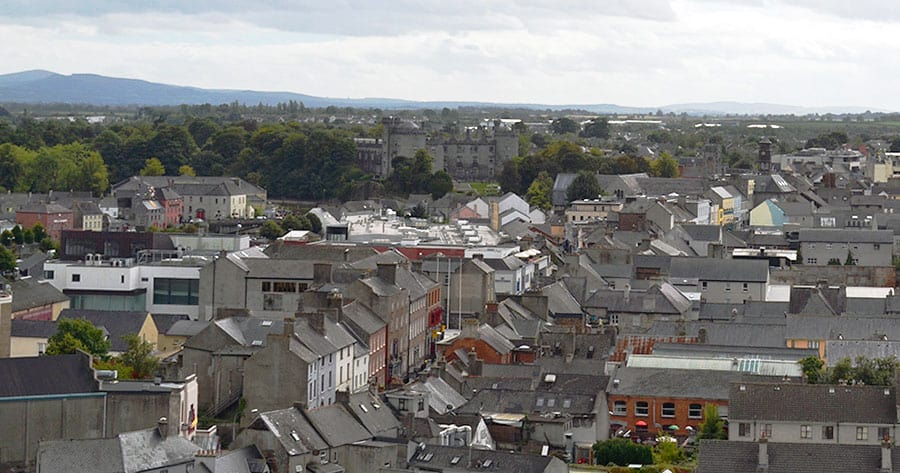 Looking over the city towards Kilkenny Castle from the top of the Round Tower. - The Irish Place