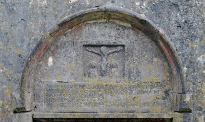 Crucification Scene dated 1644 in the southern wall of Kilnaboy Church - The Irish Place