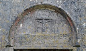 Crucification Scene dated 1644 in the southern wall of Kilnaboy Church - The Irish Place