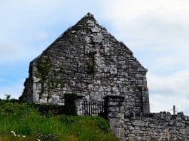 The Cross of Lorraine on the gable wall of Kilnaboy Church - The Irish Place