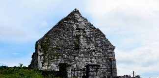 The Cross of Lorraine on the gable wall of Kilnaboy Church - The Irish Place