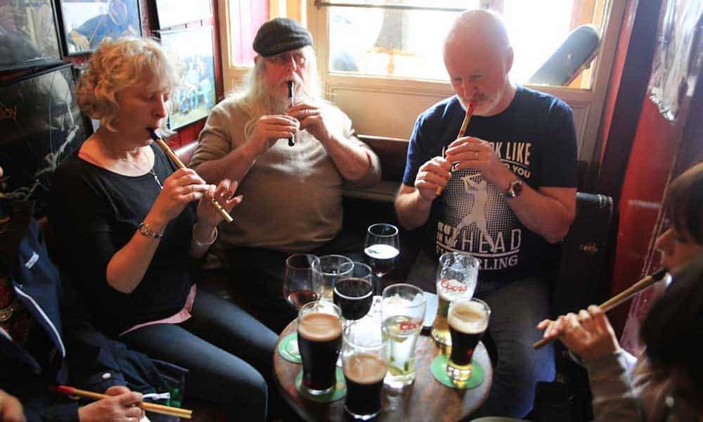 Seán Ryan in session with a group of fellow musicians