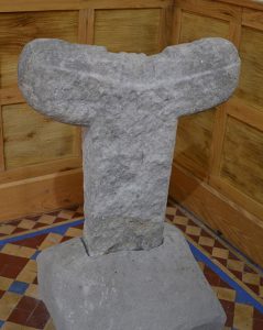 The original Tau Cross from Roughan Hill on display in the Clare Heritage Museum. - The Irish Place