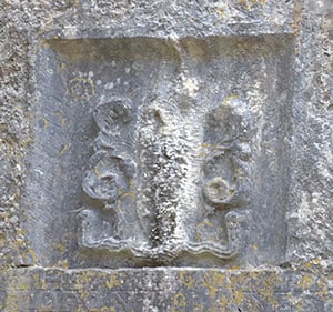 The carving of a creature in the wall of Kilnaboy Church. - The Irish Place