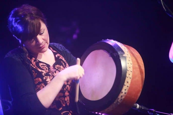 Kathy Jordan playing the Bodhrán - The Irish Place