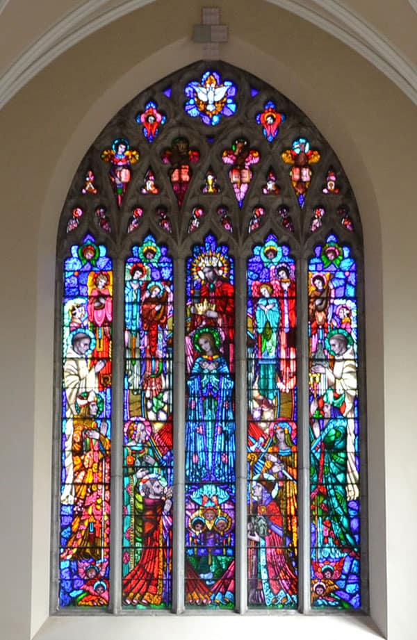 The magnificent stained-glass window in the Abbey depicting Heaven, the goal of Christian and monastic life. Also depicted are figures of Christian and monastic traditions to which the monks of Mount Melleray are heirs - The Irish Place