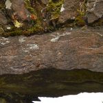 The Ogham Stone used as a lintel in the South Wall near the Eastern Gable Wall.