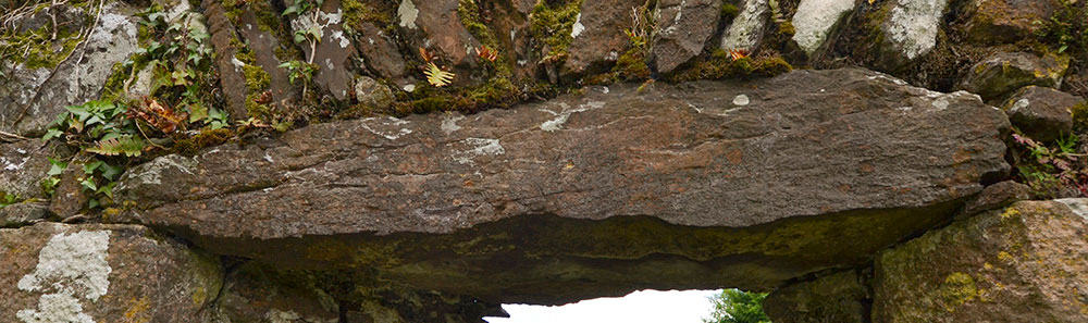 The Ogham Stone used as a lintel in the South Wall near the Eastern Gable Wall in Seskinan Church - The Irish Place