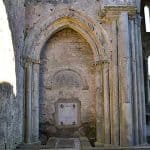 The bricked up entrance of the North Transcept Chapel.