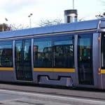 A LUAS Tram in Dublin approaching a stop.